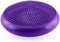 Purple silicone scrubber with textured surface on a white background
